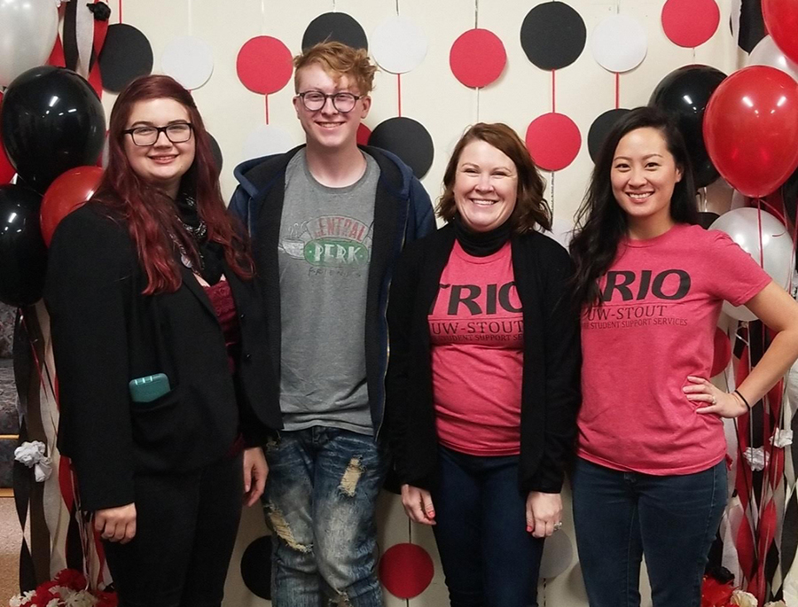 UW-Stout student Colin Carlson, second from left, is part of the TRIO SSS program and believes it helped him succeed and thrive at college. Also pictured at left is Jordyn Krahn, a TRIO SSS graduate, Angie Ruppe, director, and Jamie VUE, adviser and writing specialist.