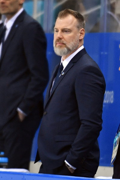 Coach Rikard Gronborg looks on Thursday,  Feb. 15, during Sweden's game in the Winter Olympics.