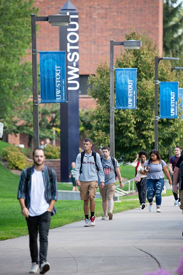 Students walk between buildings Wednesday, Sept. 4, at UW-Stout during the first day of 2019-20 fall semester classes.