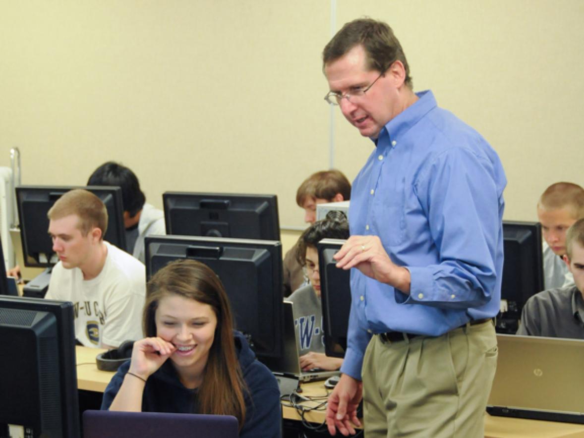 Professor Terry Mason works with an applied mathematics and computer science student at UW-Stout