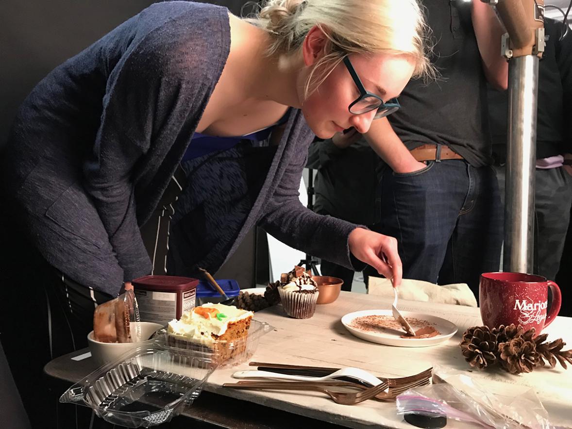 UW-Stout student Cambria Sinclair stylizes food for a photo shoot of foods from Marion’s Legacy in Menomonie.