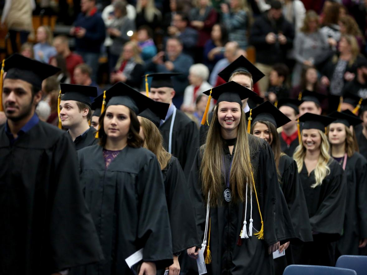 Graduates from 2016 take part in commencement at UW-Stout, which is hoping to connect with them and 2011 graduates for a survey about career success.