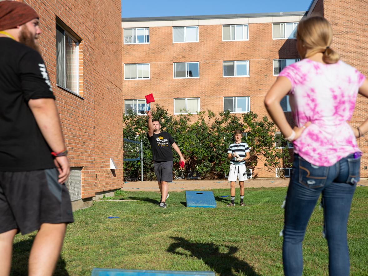 Students playing bean bags