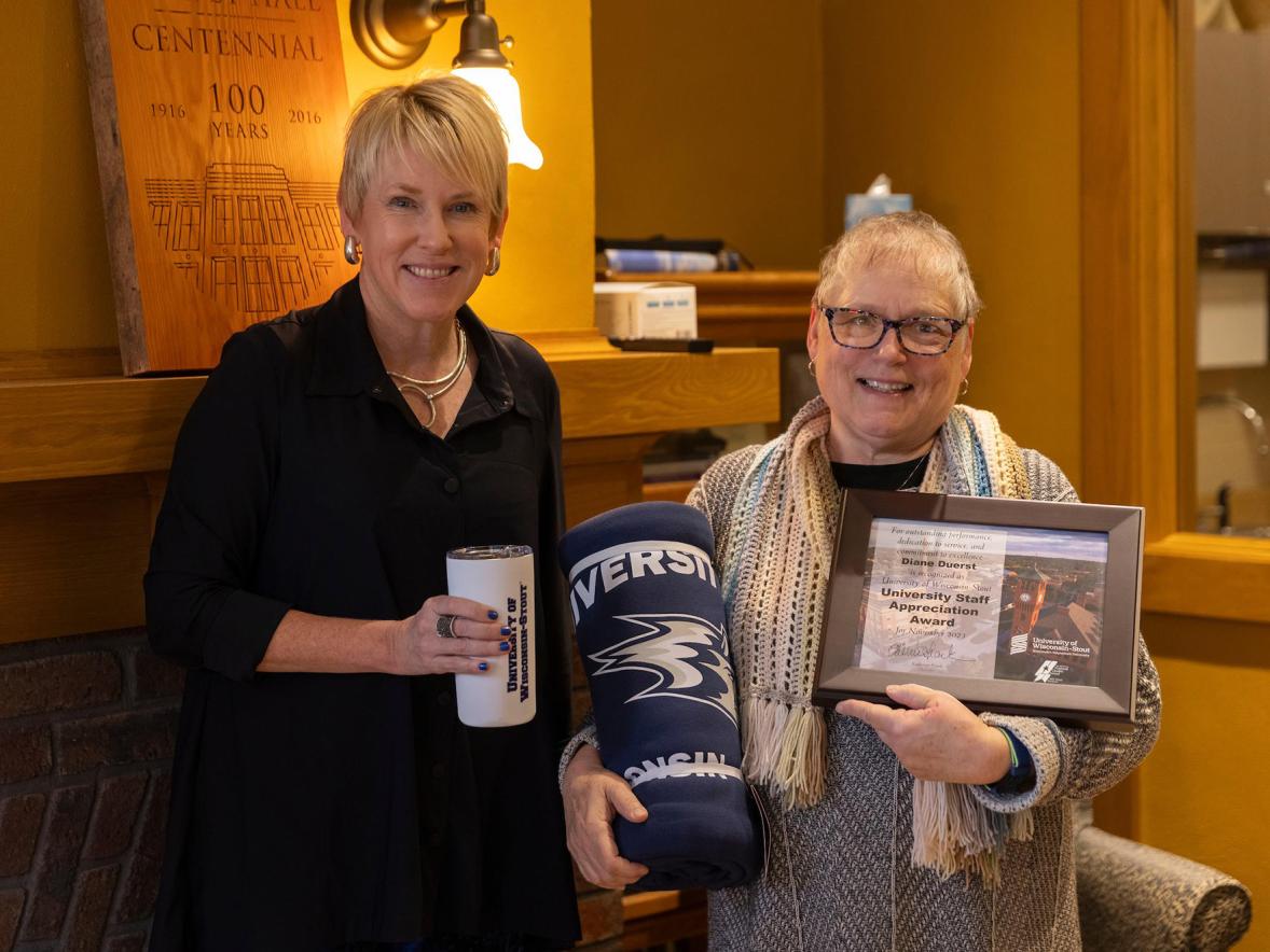 Diane Duerst, right, receives the November University Staff Employee Appreciation award from Chancellor Katherine Frank.