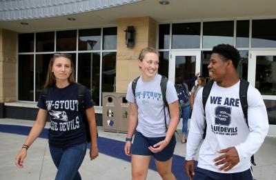 UW-Stout students are pictured interacting on campus together Tuesday, August 8, 2017. Pictured from left are Elly Friberg, Jenna Welke and Keyshawn Carpenter. (UW-Stout Photo by Brett T. Roseman)